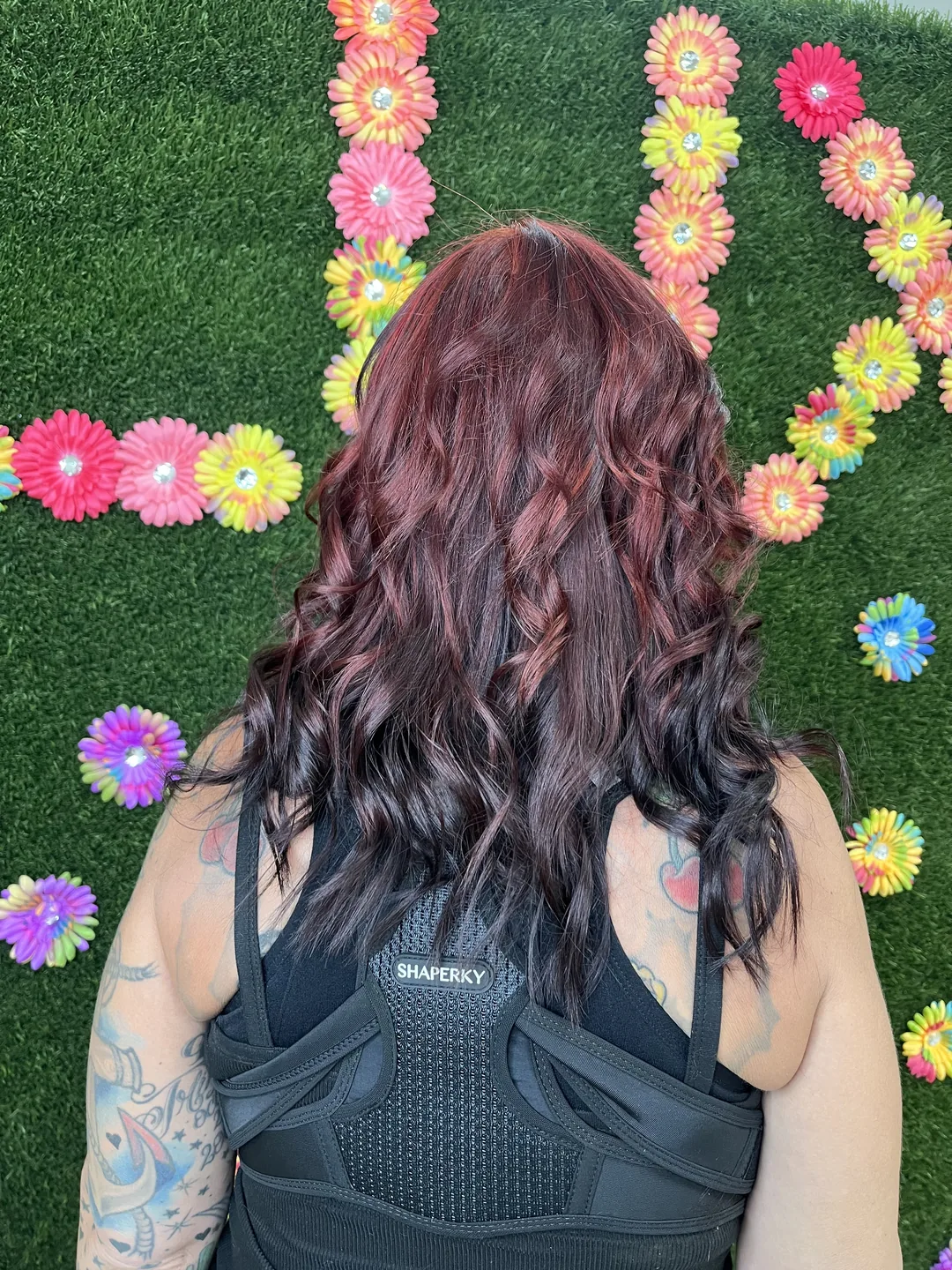 dark plum-burgundy color on long waves floral wall
